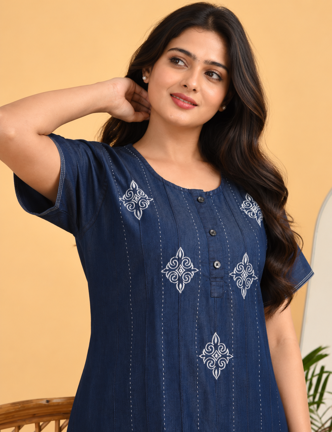 Close-up of white embroidery on the dark blue denim nighty from Jammies Haven