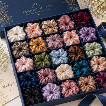 Pack of 24 multicolor satin-look hair scrunchies in a navy gift box